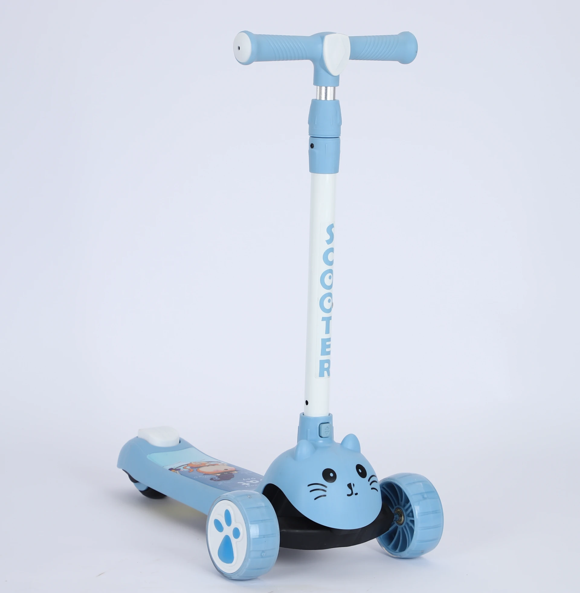 kid riding balance bike